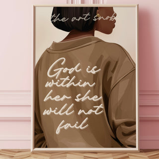 Framed artwork of a black woman wearing a brown sweatshirt with text the text “God is within her she will not fail” on a pink wall.