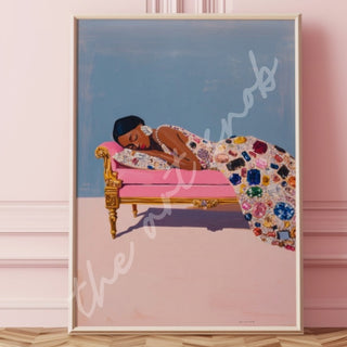 Black woman resting on a pink chaise lounge with ornate gold trim, wearing a gown covered in colorful gemstones against a blue background.